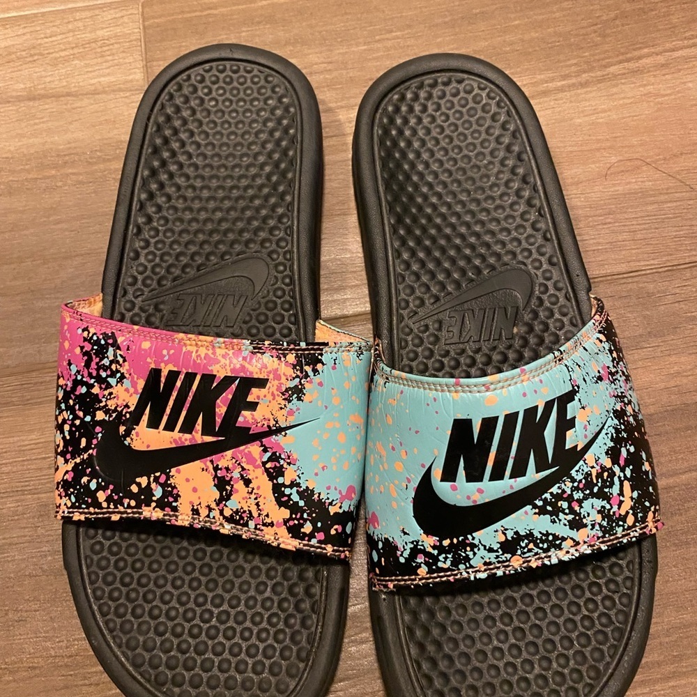Nike Black Slides with Vibrant Splatter Design